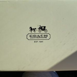 Black leather coach ankle boots